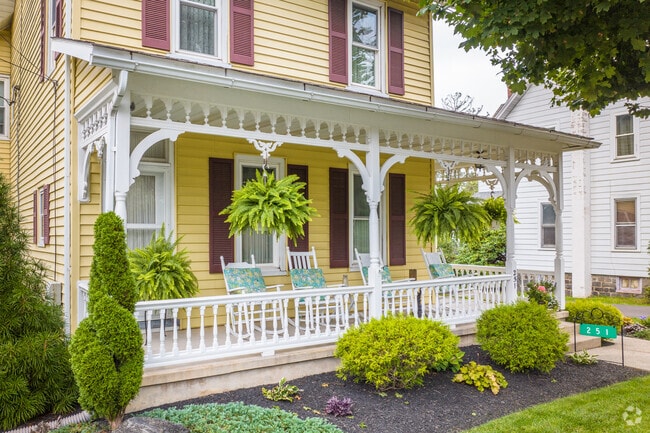 Ornate front porches are common on homes in Milford-Quakertown.
