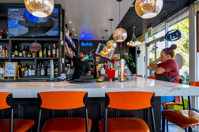 The Funny Farm serves up sandwiches, wraps, and burgers with a cozy patio and full bar.