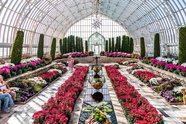 The Marjorie McNeely Conservatory draws visitors for there seasonal changing flower displays.