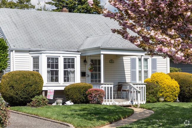 Quaint homes with bay windows and front porches dot the streets of Spring Lake Heights.