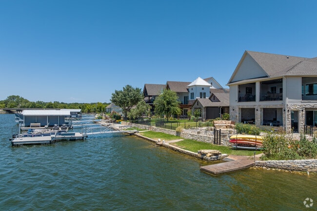 Large homes sit on Lake Granbury and often feature boat docks.