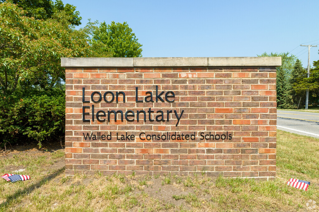 Main entrance sign on Loon Lake Road at Loon Lake Elementary School in Wixom.