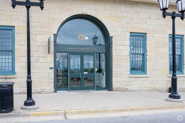 The Aurora Metra station, near Eola Yards is a 57 minute train ride to Chicago.