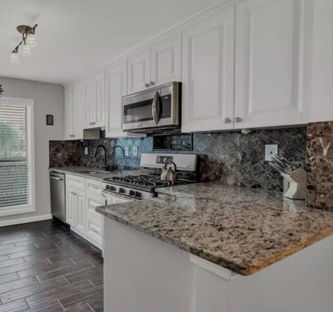 908 Woodcliff Dr, Atlanta, GA 30350 - photo 2