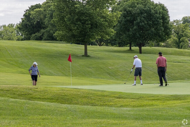 Locals take advantage of nice weather and play golf at the Beavercreek Golf Club.