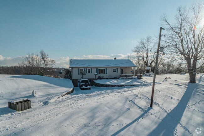Ranch homes are common throughout the Summit neighborhood, with many perched at the top of tall hills.