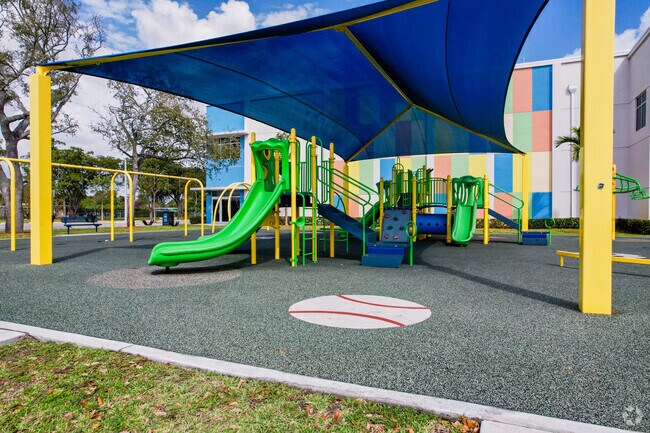 Children in the Bunche Park neighborhood enjoy playing at the local playground.