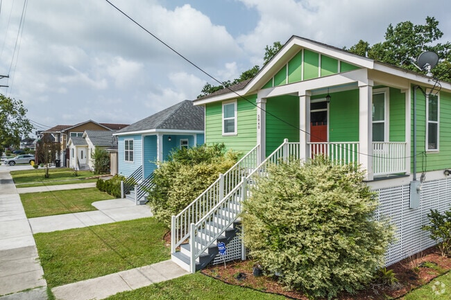 Rows of colorful homes line the street in Milneburg.