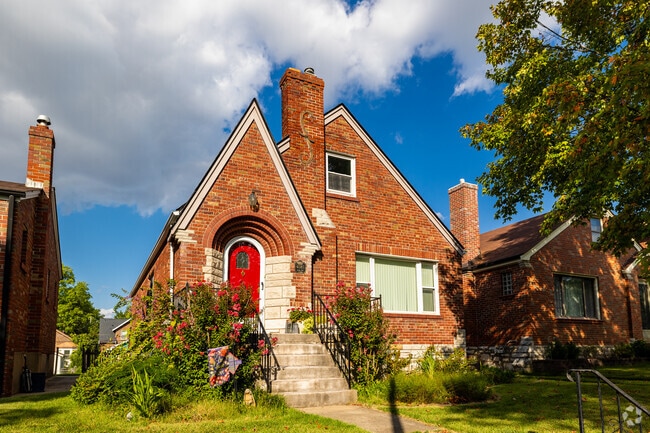 A stately Tudor-influenced brick home in Boulevard Heights.