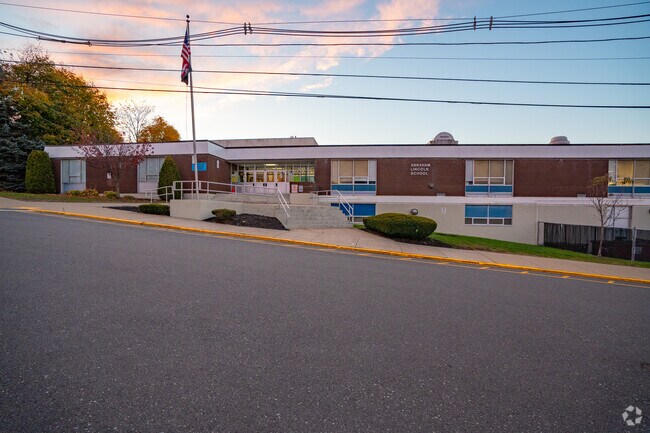A breathtaking sunset cast a beautiful glow behind the Abraham Lincoln Elementary School.