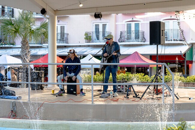 Listen to live music as you shop and dine at the European Village Harvest Festival.