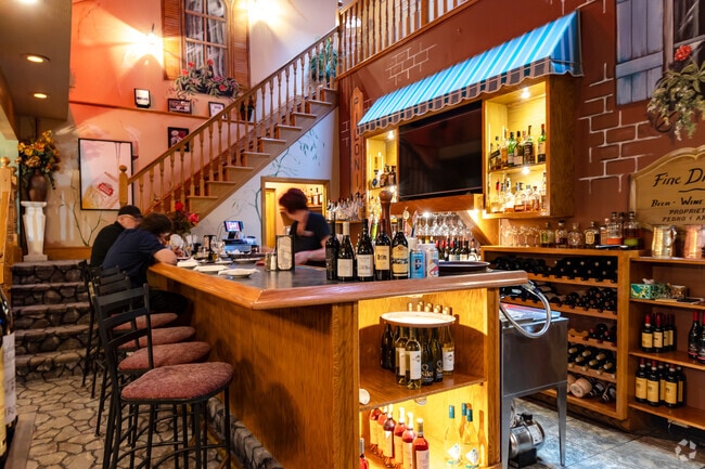 Piloni's Italian Restaurant offers cozy charm and classic dishes in Plaza North-Highland.