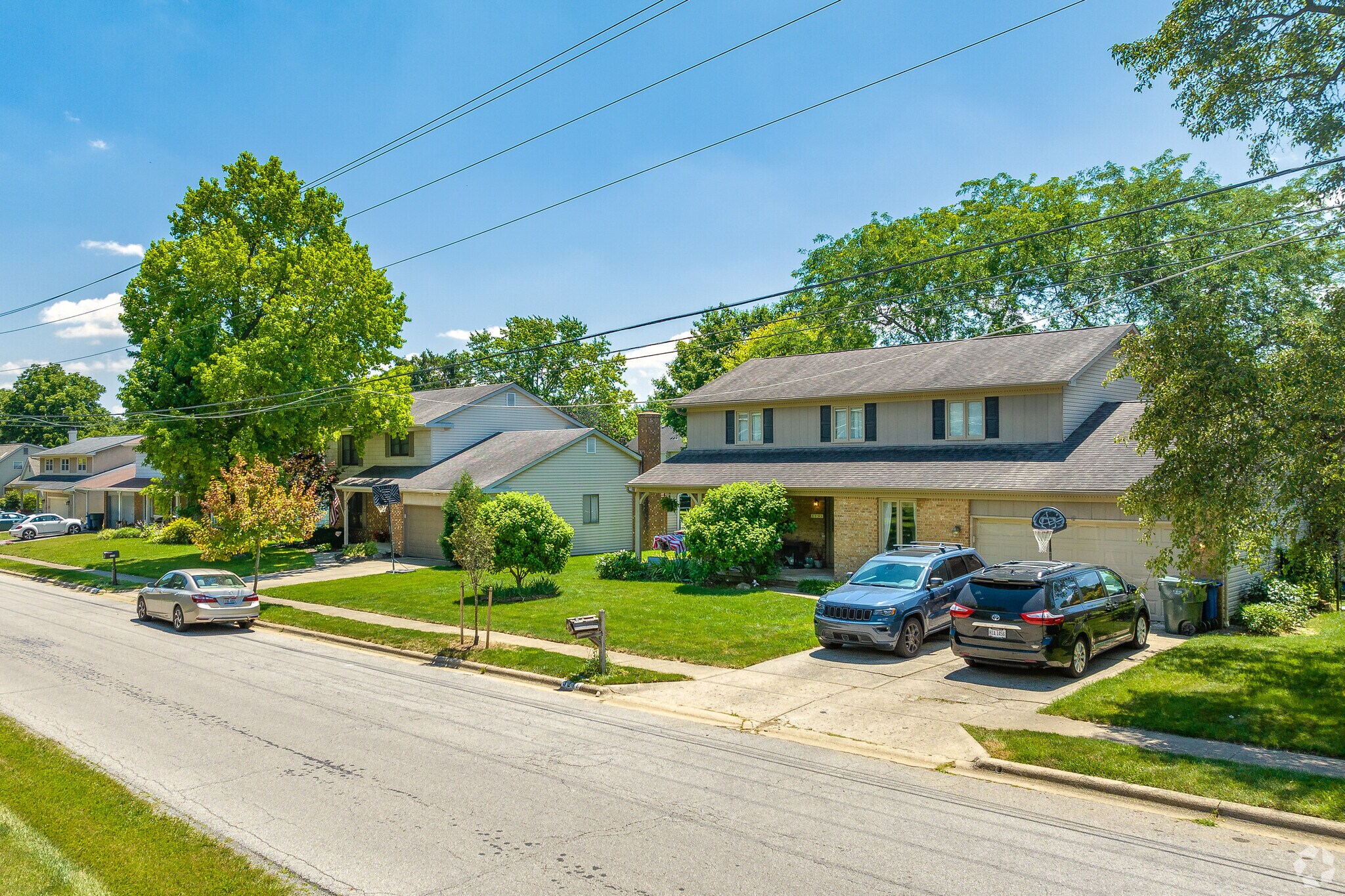 Two-story homes in the Riverplace neighborhood feature well-manicured front yards.