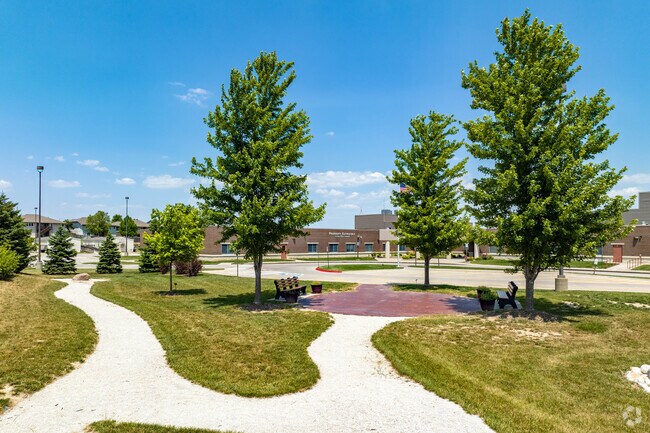 You will find a green seating area in front of Palisades Elementary School.