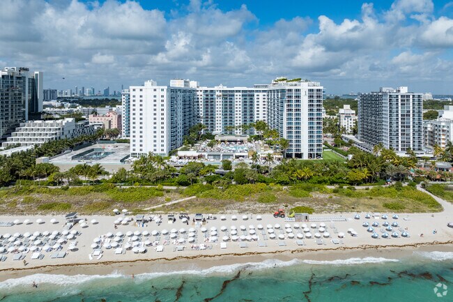Roney Palace offers both condo residences and a hotel with views to the Miami Beach Boardwalk.