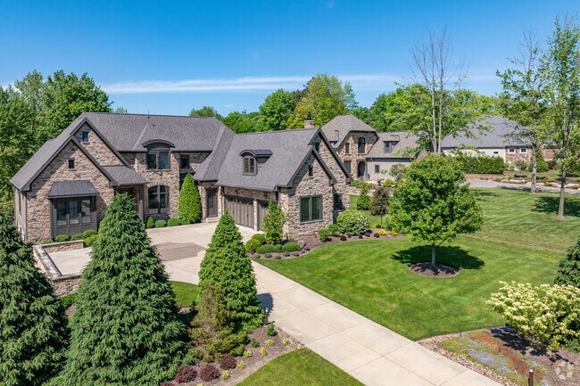 Pepper Pike homes sit on spacious lots with many trees and well groomed lawns.