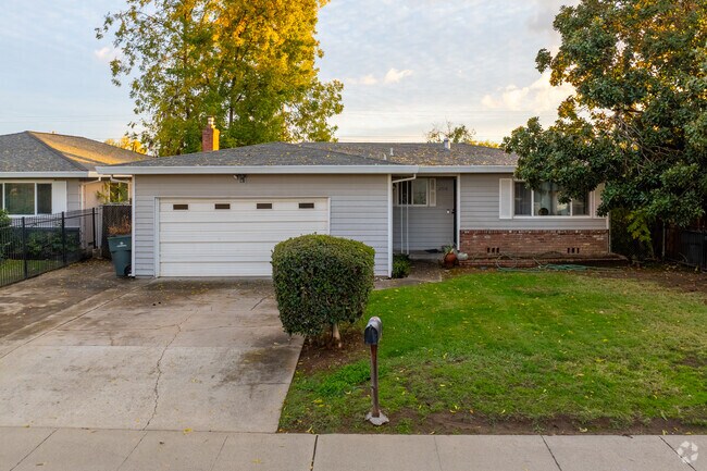 Manicured lawns are common feature of homes in Woodbine.