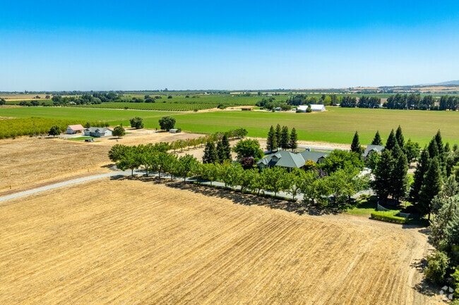 Rural acreage at the town’s edge supports hobby farms and community traditions