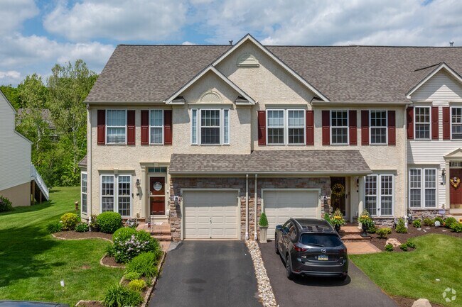 Large townhomes with garages are situated in comfortable communities in Sanatoga.