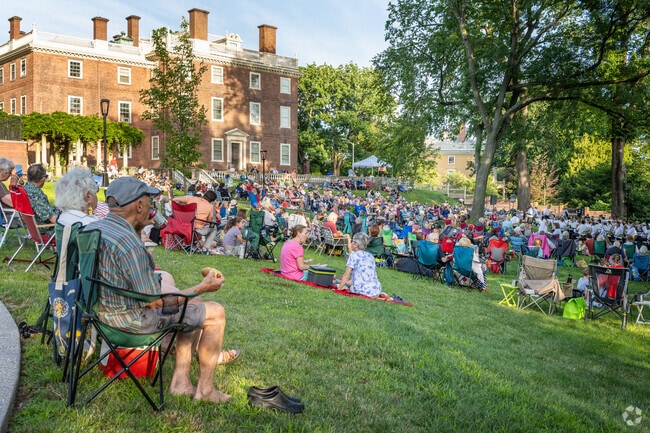 Enjoy an evening of live musicals and culinary delights at Concerts Under The Elms, Providence.