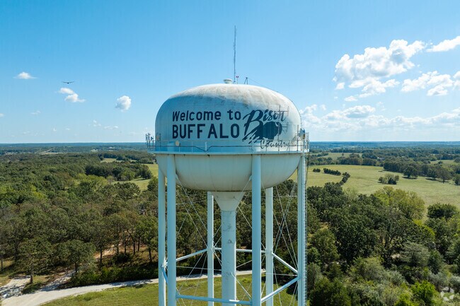 Quiet prairie surroundings border Buffalo's residences.