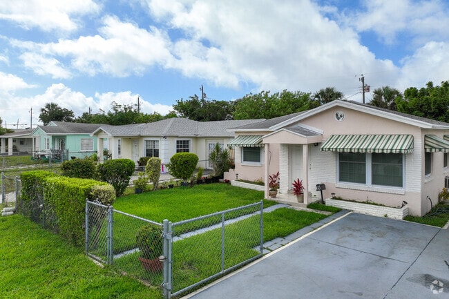 Ranch-style homes line up on the streets of the Riviera Beach neighborhood.