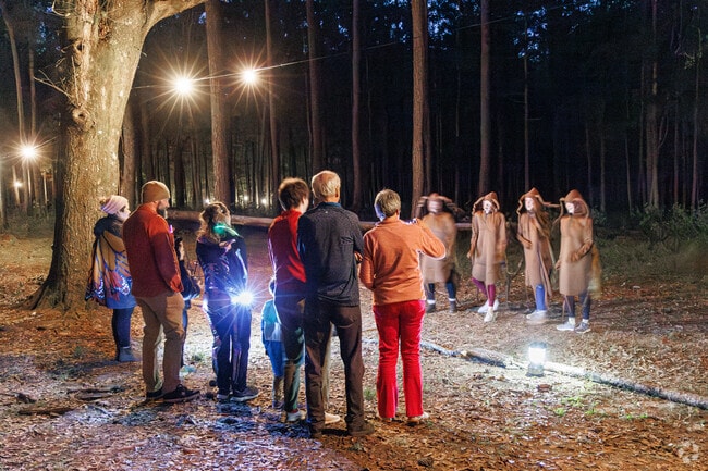 Go to the Halloween Enchanted Forest near Mckinley Heights to watch the cockroaches dance.