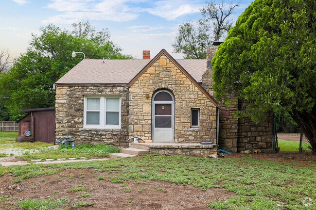 The stone siding on this home in Orchard Breeze completes the historic look.