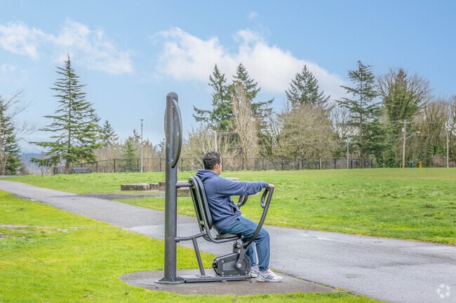 Work out using the exercise equipment at West Fenwick Park near South Des Moines.