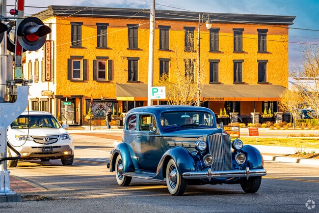 Classic cars cruise the streets of Fenton.