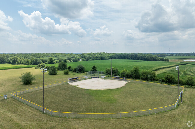 Students can play baseball or softball, =t the field at Battle Ground Elementary School.