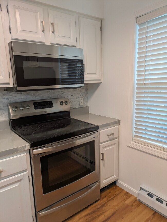 Stainless steel appliances including microwave and dishwasher