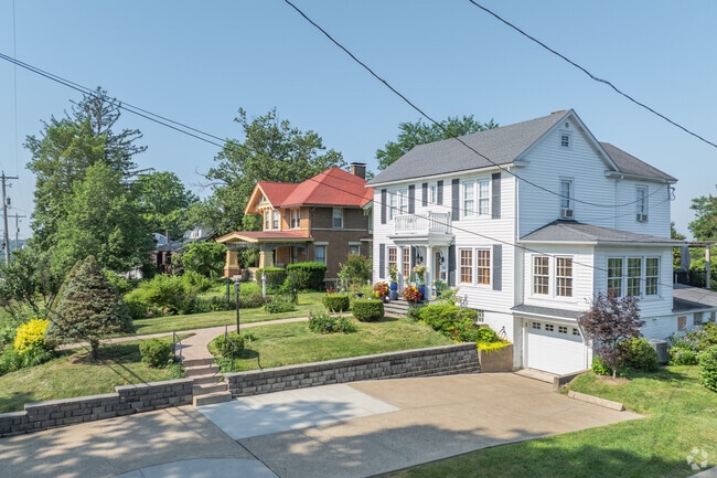 Find yourself a cozy traditional-style home on green lawns in Saint Clairsville.