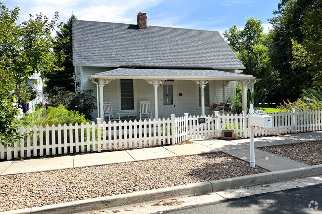 Small homes with picket fences line streets in Castle Rock's Craig-Gould neighborhood.