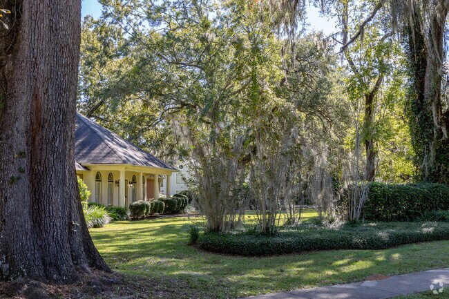 Custom-built homes with well-manicured lawns line the streets of Northeast Florida subdivisions.