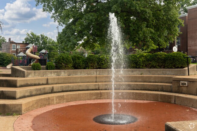 Tiffany Park has a predominant water fountain feature with a tiered concrete semi-circle.