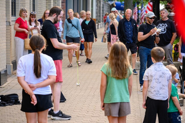 Street performers entertain visitors during Holland's 4th of July program.