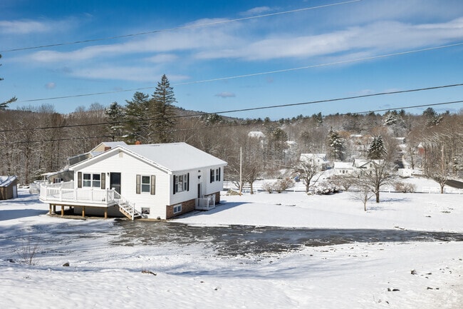 These homes descend the quiet hills of Greene.