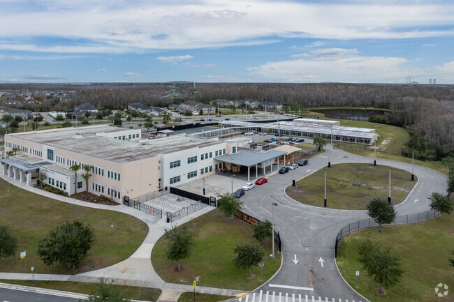 A spacious awning ensures safety during drop-off at Sun Blaze Elementary School.