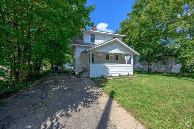 A large bungalow sits on busy Oakland Drive in the Oakwood neighborhood.