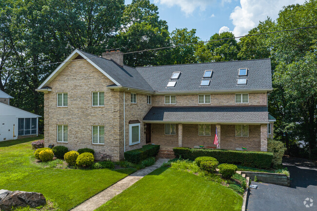 A classic Colonial home in Northwest Wilmington with a large front porch.