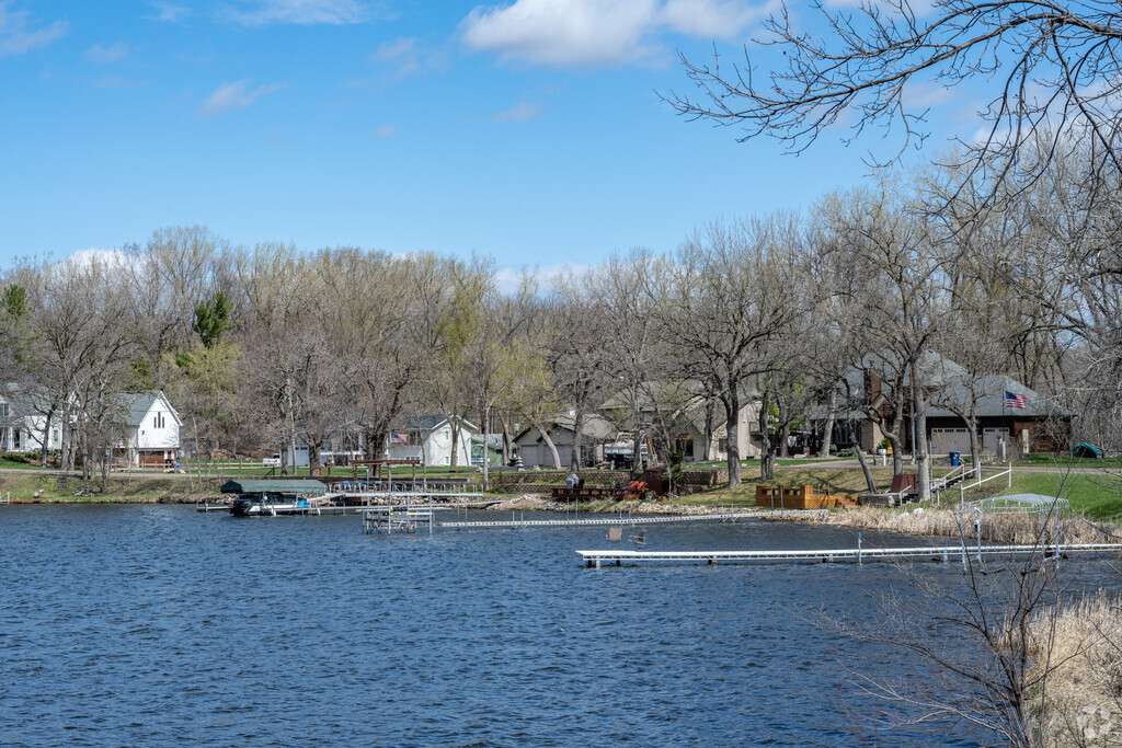 The lake shore is lined with docks and houses bringing life to the Kohlman lake neighborhood