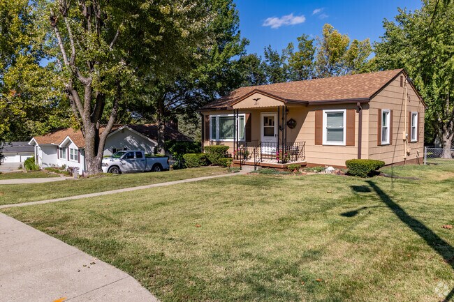 Claycomo offers cozy family homes with spacious front lawns.