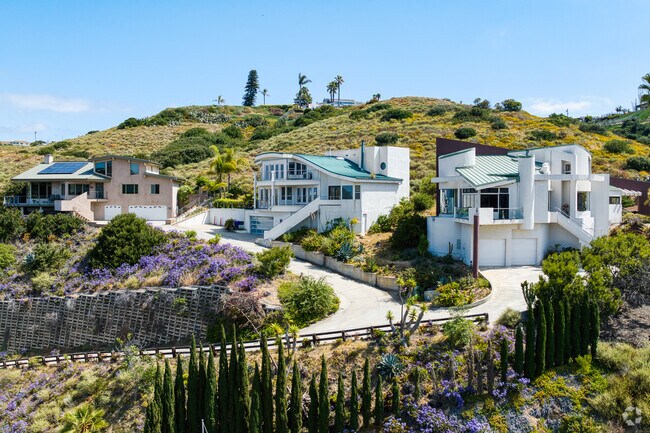 In the hills of Bay Park are larger custom homes with view of Mission Bay.
