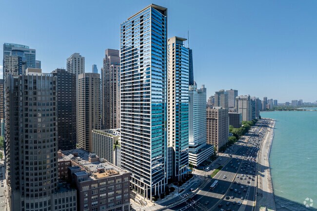 Luxury towers sit shining in the sun at 600 N Lake Shore Drive.