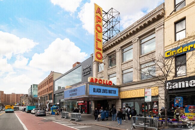 Popular Central Harlem performance venue Apollo Theater opened its doors in 1914.