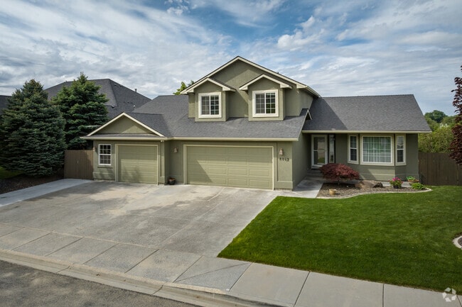 Homes in Southwest Boise sit on well-maintained lawns.