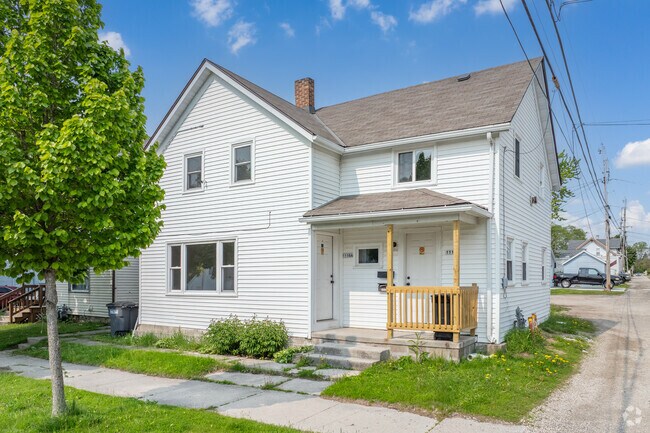 Central Sheboygan features duplex homes with shared yards and walkable streets.