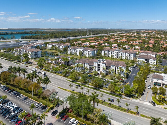 A midsize apartment complex sits within a gated community.