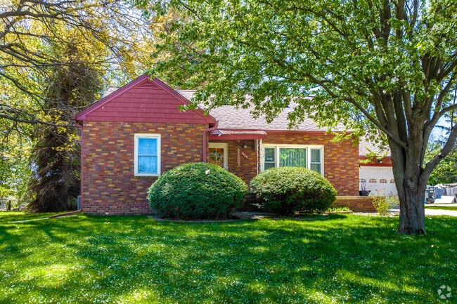 Lush lawns and mature trees surround many beautiful Watrous South homes.